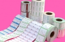 Reel adhesive labels